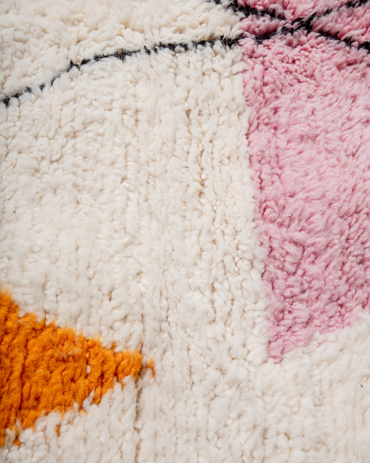 Modern, designer, handcrafted Berber rug from Morocco. Beniourain carpet with beautiful colours and patterns and fluffy wool texture.